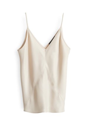 Light beige camisole top with thin straps, V-neckline, and diagonal seam detail. Made from smooth, stretchy fabric, tailored fit.