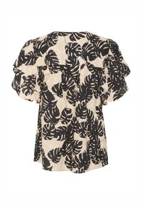 Blusa a maniche corte nera e crema con motivo a foglie, tessuto testurizzato, vestibilità ampia e scollatura rotonda.