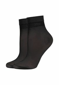 Chaussettes noires à chevilles en matériau lisse et transparent, avec une bande élastique confortable au-dessus, arborant le nom de la marque "JOOP."