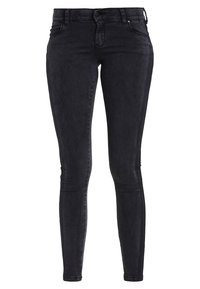 Jeans negros ajustados de mezclilla con una textura suave, que cuentan con cierre de cremallera, diseño de cinco bolsillos y detalles de costura mínimos.