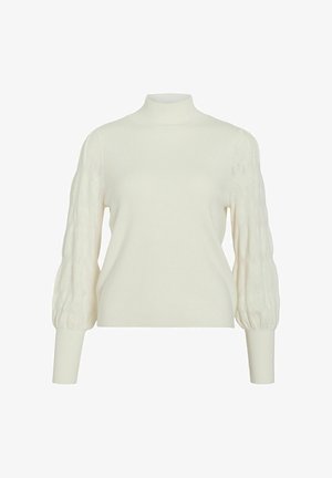 Cream knit sweater with high neck and balloon sleeves featuring subtle textured diamond patterns.