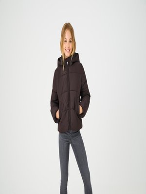 Black puffer jacket with a hood, featuring a front zipper, two side pockets, and a quilted texture. Paired with gray fitted jeans.