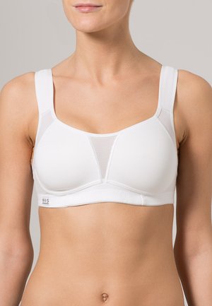 White sports bra with wide straps, soft fabric, and mesh panel detailing at the front for breathability. Features a smooth, seamless design.