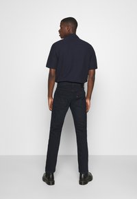 Levi's® 502 TAPER - Calças de ganga de corte afunilado - blue ridge