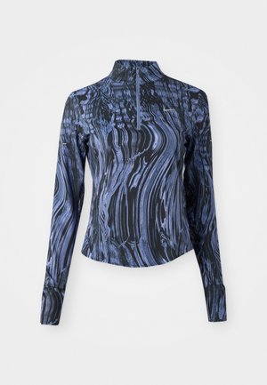 Long-sleeve athletic top in dark blue with purple marbled pattern, featuring a high collar and half-zip closure. Smooth, stretchy fabric.