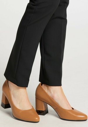 Højhælede pumps - cognac