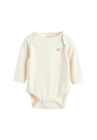 Body bébé à manches longues en tissu côtelé crème avec un petit logo d'ours sur la poitrine et des boutons-pression à la base.