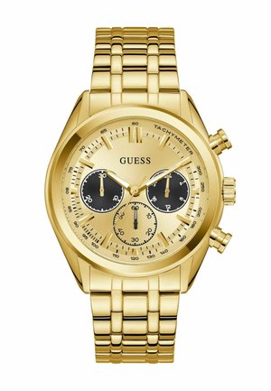 Montre Guess couleur or avec un cadran rond, des sous-cadrans noirs, trois boutons chronographes et un bracelet en métal lié.
