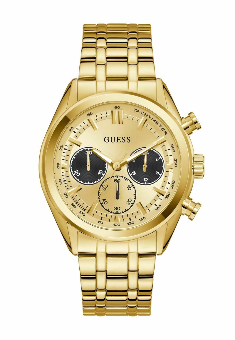 Montre Guess couleur or avec un cadran rond, des sous-cadrans noirs, trois boutons chronographes et un bracelet en métal lié.