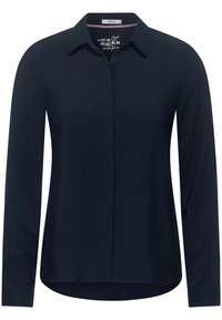 Camicia a maniche lunghe blu navy con bottoni, caratterizzata da un motivo a griglia testurizzato, colletto classico e orlo curvo. Realizzata in un tessuto morbido.