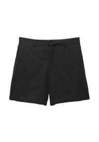 Black linen shorts with a tailored design, featuring a flat front, side pockets, and a zip fly. The fabric has a smooth texture.
