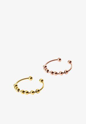 Zwei offene Armreifen, einer aus Gold und einer aus Roségold, jeweils mit einer Reihe kleiner runder Perlen und abgerundeten Endkappen, auf weißem Hintergrund.