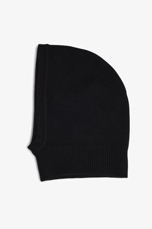 Black knit beanie with a rounded top, ribbed cuff, and soft texture. The design features a solid color without any patterns or embellishments.