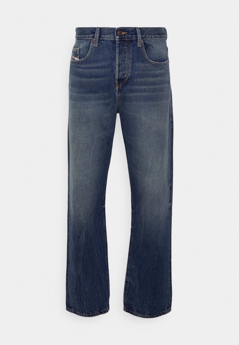 Jeans aus Denim in einer dunklen blauen Waschung mit einer lässigen Passform. Verfügt über fünf Taschen, einen Reißverschluss und sichtbare Nahtakzente.