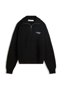 Black knitted zip-up sweater with a tall collar, ribbed texture, and silver ring zipper pull. Features light gray embroidered text on the chest.