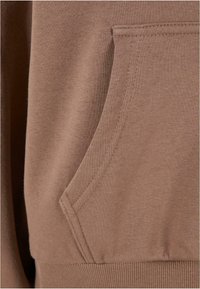 Karl Kani KW-HD031-024-05 KK SMALL SIGNATURE ESSENTIAL OS  - Kapucnis pulóver - taupe