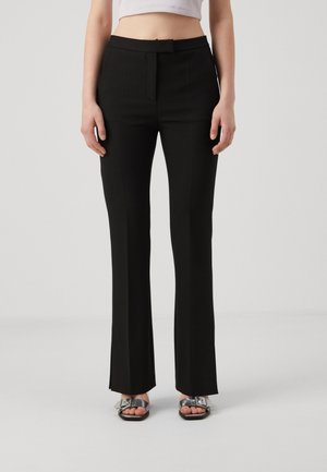 Spodnie materiałowe