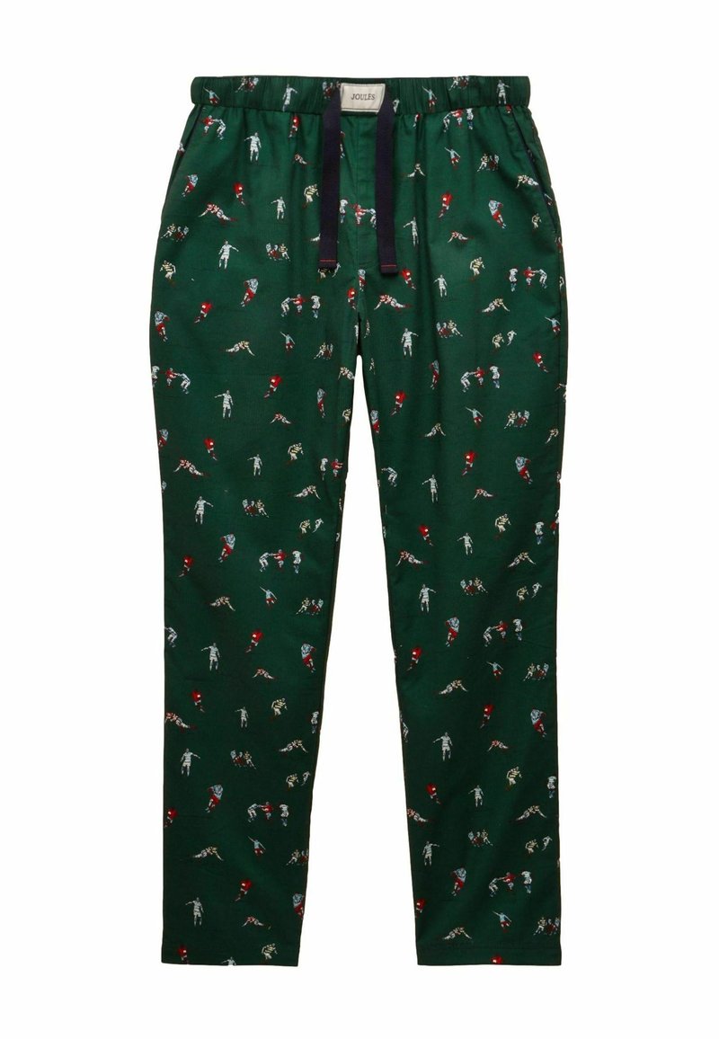 Zaļi pidžamas bikses ar rakstainu dizainu, kas ietver dažādus mazos, krāsainos attēlus. Elastīgs jostasvīrs ar tumši zilu saites akcentu.