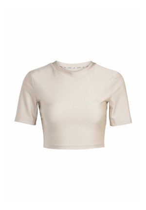 Ljusbeige kortärmad t-shirt i smidigt, stretchigt tyg. Har en rund halsringning och korta ärmar med en tajt passform.
