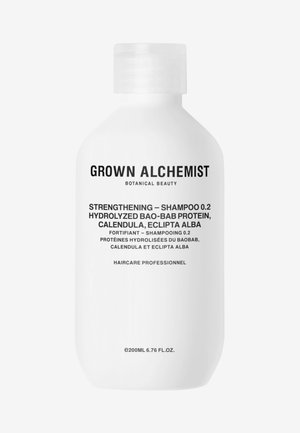 Bottiglia di plastica bianca dalla forma arrotondata, con testo nero che indica il nome del prodotto e gli ingredienti, tra cui "Shampoo Rinforzante 0.2," 200ml.