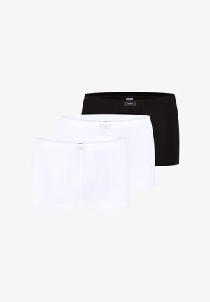 Tre herre boxershorts i sort og hvid, stablet med den sorte bagest og to hvide par foran, ensfarvet design med branded linning.