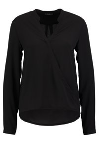 Blouse noire à manches longues avec devant croisé et col rond, comprenant un subtil détail en trou de serrure au niveau de la partie supérieure de la poitrine.