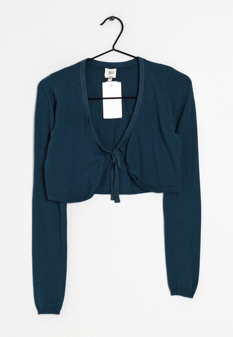 Cardigan court en vert canard en tissu doux, doté de manches longues, d'une fermeture par liens à l'avant et d'un col rond avec une finition côtelée.