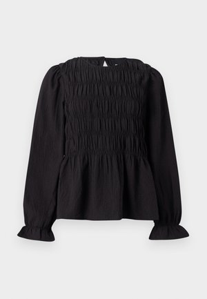 Blouse noire à manches longues avec texture froncée, encolure ronde et manches évasées. Dispose d'une ouverture en goutte d'eau dans le dos et d'une taille froncée.