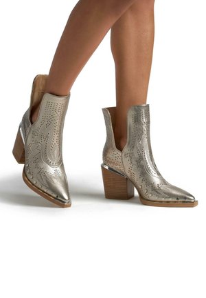 High Heel Stiefelette - bronce