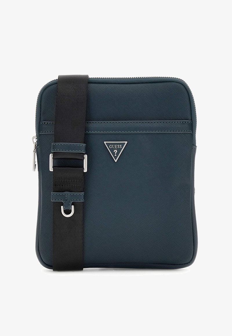 Borsa a tracolla sintetica di colore blu scuro con finitura testurizzata, caratterizzata da un logo triangolare in argento, una tracolla nera regolabile e chiusura a zip.