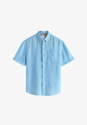 Rövid ujjú gombos ing világoskék anyagból, texturált mintával és egyetlen mellzsebbel. Hagyományos gallérral és gombolással.