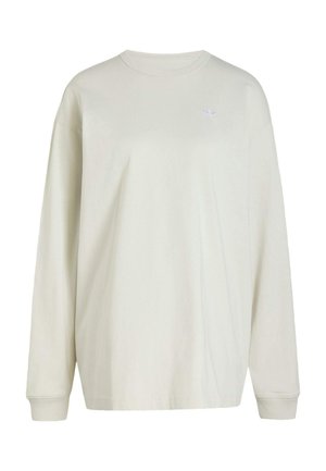 Sweat-shirt à manches longues écru avec col rond, poignets côtelés et petit logo Adidas sur la partie supérieure gauche de la poitrine.