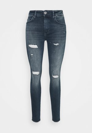 Donkere blauwe skinny jeans met gescheurde details op dijen en knieën, voorzakken, riemlussen en knoopsluiting.