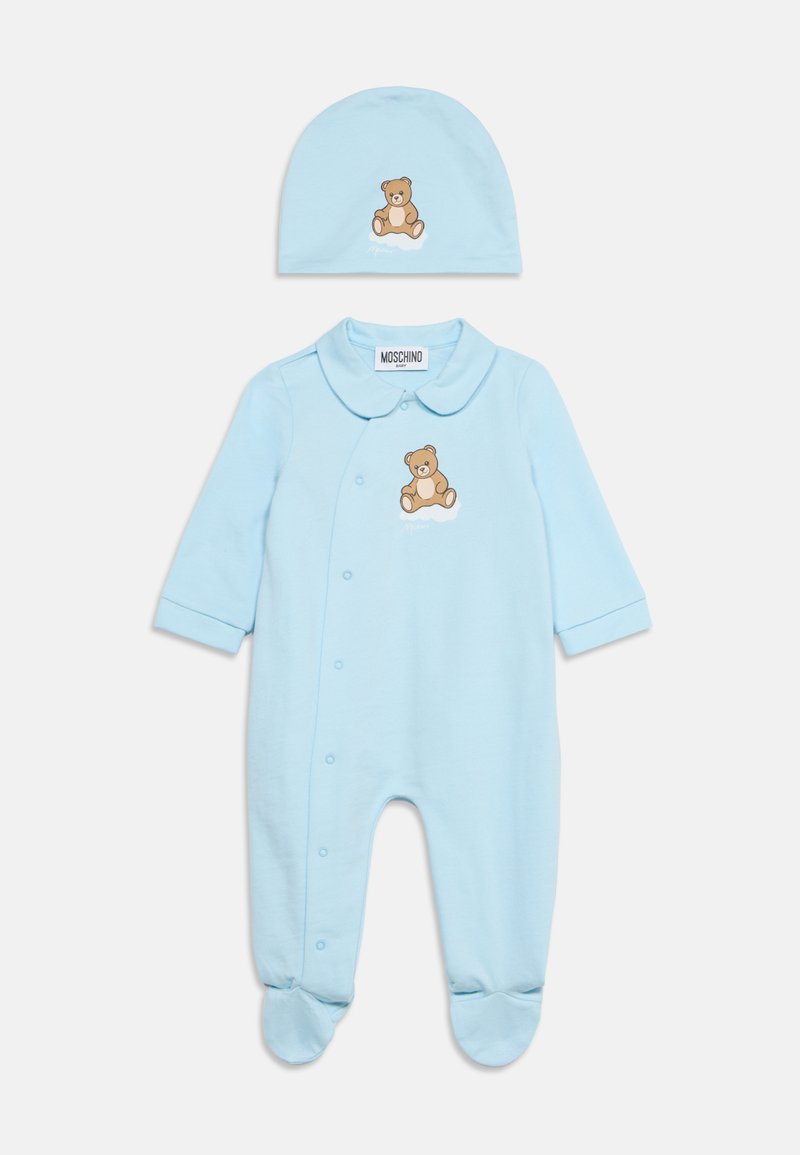 Body bleu clair pour bébé avec couvre-pieds et bonnet assorti, les deux présentant un petit motif d'ourson sur le devant.