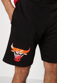 New Era Krótkie spodenki sportowe