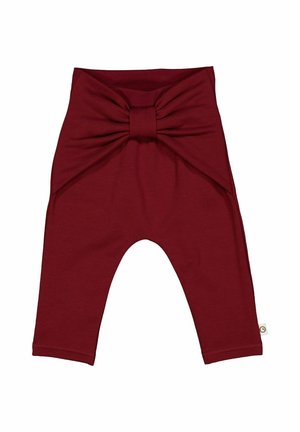 Burgunderfarbene Kinderleggings aus weichem Stoff, mit einer großen Schleife auf der Vorderseite und schmal zulaufenden Beinen mit genähten Säumen.