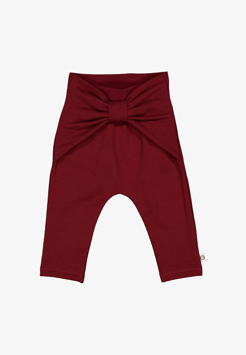 Burgundské dětské legíny vyrobené z měkkého materiálu, zdobené velkou mašlí na přední straně a zúženými nohavicemi s prošitými lemy.