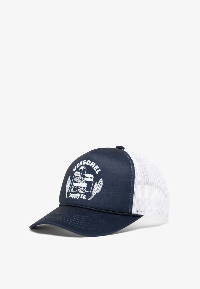 Navy blue trucker cap with white mesh back. Features embroidered "Herschel Supply Co." logo and graphic on front panel. Soft fabric brim.