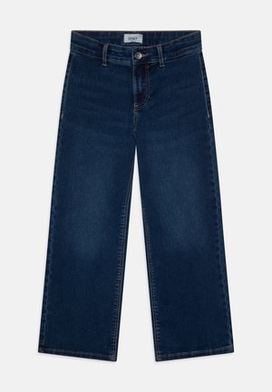 Mørkeblå denim jeans med vide ben, forreste knapper og lynlås, bæltestropper og en hvid label med teksten ONLY på taljen.