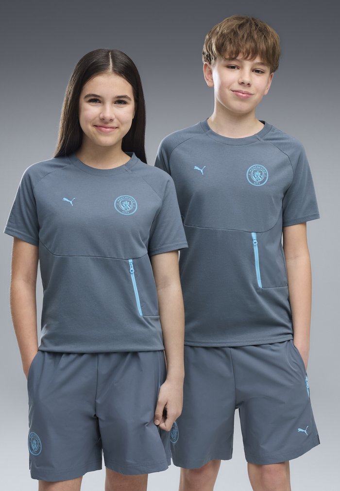 PUMA MANCHESTER CITY PUMATECH POCKET T-SHIRT UNISEX - Print T-shirt - evening sky-luminous blue
