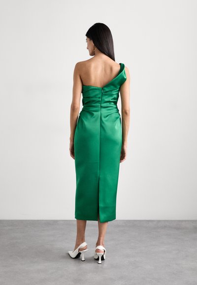 Green satin dress with a one-shoulder design, fitted bodice, and knee-length hem. Features a back zipper and a slit for movement.