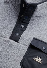 Superdry & Co FUJI HALF POPPER - Fleece trui - washed denim blue