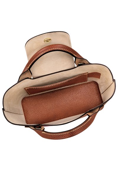 Brown leather bag with a smooth exterior, a textured inside, and gold hardware. Features dual handles and a structured shape.