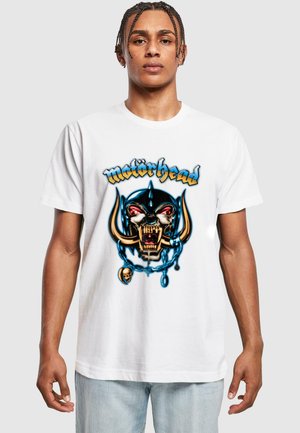 White cotton t-shirt featuring Motorhead graphic, with a detailed skull design, metallic accents, blue chain, and colorful eyes.