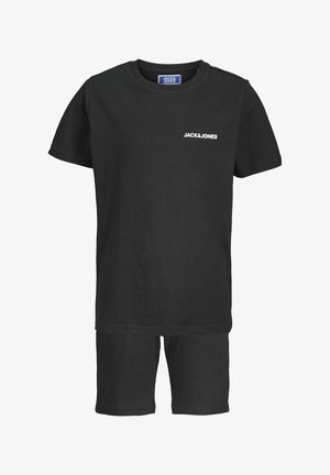 Svart bomulls t-skjorte med korte ermer og logo på brystet, kombinert med matchende svarte shorts. Enkelt design, uformell passform.