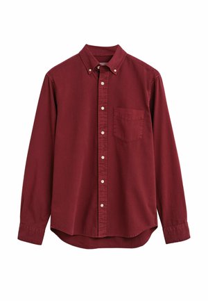 Bordeauxfarbendes Hemd mit Knöpfen, Kragen, langen Ärmeln und einer Brusttasche. Hergestellt aus einem glatten Stoff mit einem leicht lockeren Schnitt.