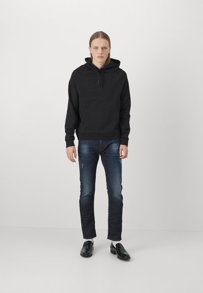 Emporio Armani Karcsúsított farmerek - denim blu