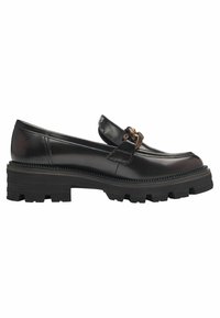 Mocassino in pelle nera con suola in gomma spessa, dettaglio decorativo con fibbia e cuciture lungo la parte superiore. Suola testurizzata per aderenza.