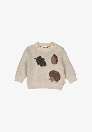 Beżowy sweter dzianinowy z okrągłym dekoltem, zdobiony brązowym wzorem jeża, liści i żołędzi. Posiada dekoracyjny guzik na ramieniu.