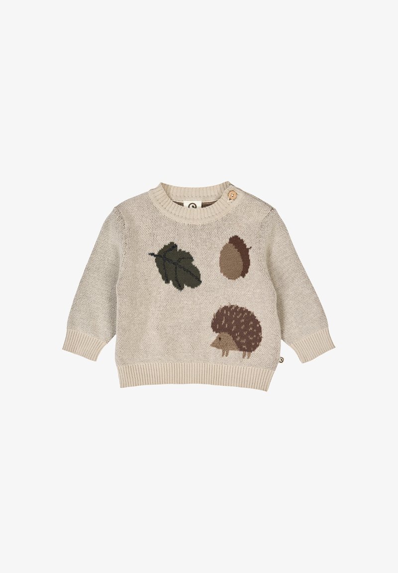 Beige neuleolkapaita pyöreällä kaula-aukolla, jossa on ruskeita siilin, lehden ja tammenterhon kuvioita. Sisältää koristeellisen napin olkapäällä.